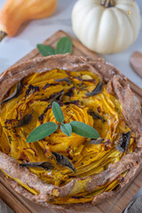 home made pumpkin quiche on a table