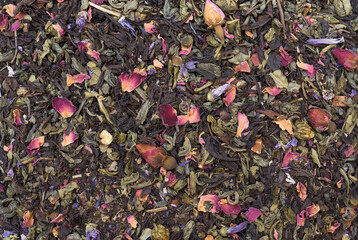 dry tea close-up.A blend of large-leaf Ceylon black tea and green tea Sencha 1001 Night with the...