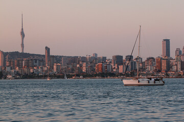 Naklejka premium Yacht in the marble sea overlooking the evening Istanbul and Camlica Hill