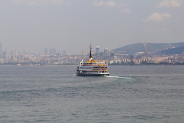 City ferry going from the Adara Islands against the background of the evening Stanbul, Turkey, Istanbul, Buyukada