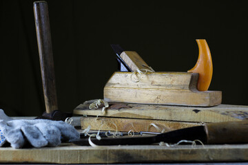 plane hammer chisel on a wood