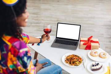 Black Female At Laptop With Empty Screen Celebrating Birthday Indoor