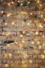 Red brick wall with lights