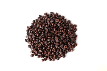 Roasted coffee beans on white background.