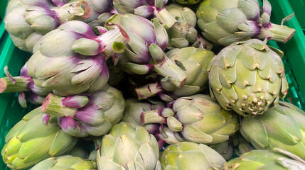 Fototapeta premium Fresh artichokes market, healthy food