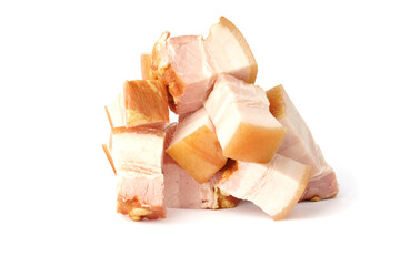 pile of fresh smoked bacon isolated on white .