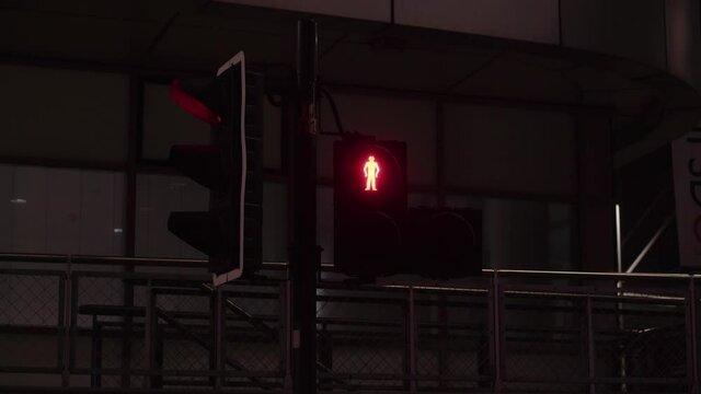 Glasgow, Scotland, United Kingdom (UK) - 13.1.22: Glasgow at night, Traffic lights displaying pedestrian and cycle signs