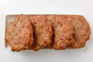Tteokgalbi on a white background