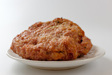 Tteokgalbi on a white background