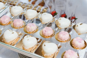 various dessert with fresh fruit on buffet line, sweet
