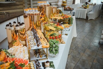 various dessert with fresh fruit on buffet line, sweet