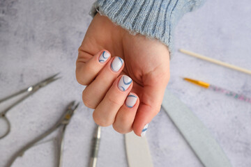 Professional stylish trendy blue Hardware Manicure. Procedure for the preparation of nails. Cuticle...