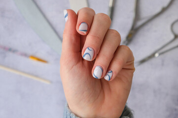 Professional stylish trendy blue Hardware Manicure. Procedure for the preparation of nails. Cuticle...