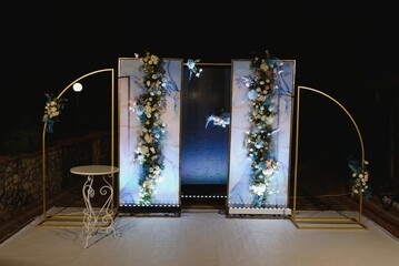wonderful wedding ceremony. trendy wedding arch made according to modern fashion. wedding decorations.