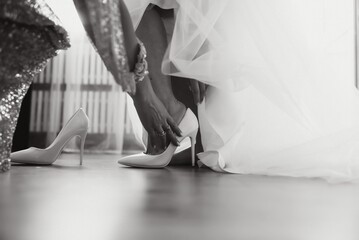 Bride dressing wedding gown. morning bride