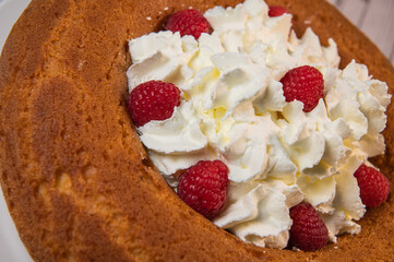 Pastry, Traditional Italian rum cake with whipped cream and raspberries. High quality photo