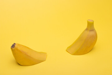 Sweet bananas on the yellow background