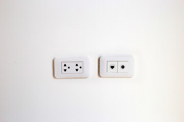 Socket on a white wall
