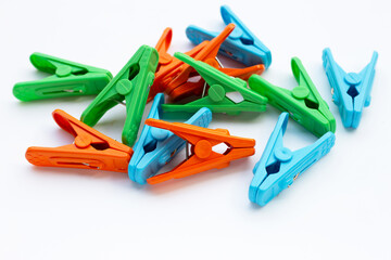 Plastic clothespin on white background.