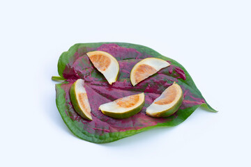 Chewing betel nut, Betel nut with red cal lime powder on betel leaves