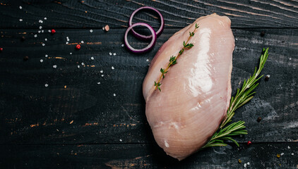 Raw turkey fillet on cutting board, Cooking ingredients. Natural healthy food concept. Long banner...