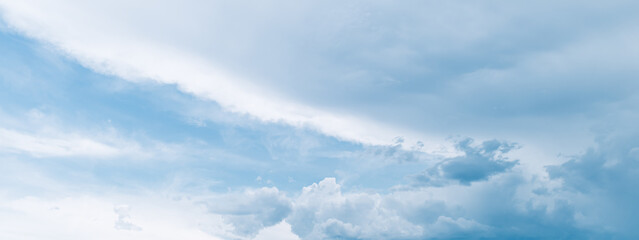 Fototapeta na wymiar Blue sunny sky with clouds.