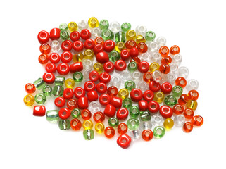 Pile of colorful beads on white background