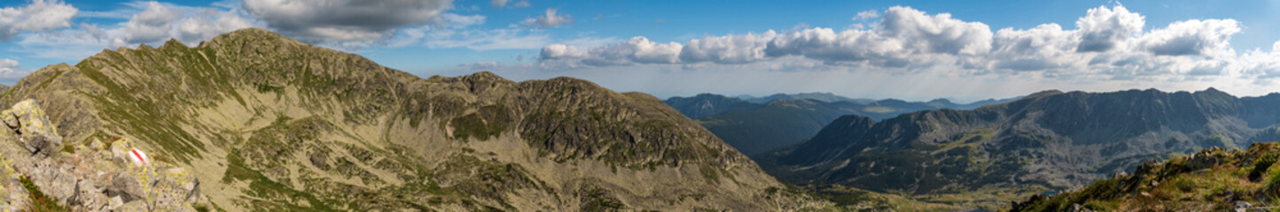 Fototapeta na wymiar View from Custura Bucurei mountain peak summit in Retezat mountains in Romania