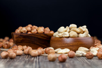 dried cashew nuts on a wooden table