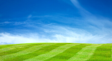 Green grass mountain landscape in summer with beautiful blue sky and white clouds. nature background