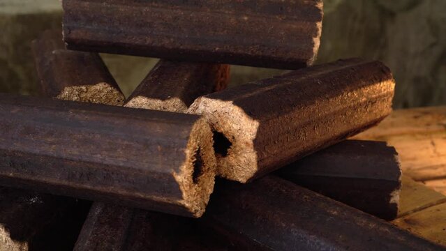 Organic Biomass Briquettes. Solid wood waste compressed fuel briquettes