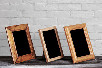 Fototapeta premium old photo frame on the wooden table