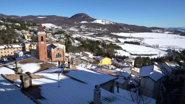 The beautiful village of Rivisondoli covered in snow during winter time. Abruzzo, central Italy.	