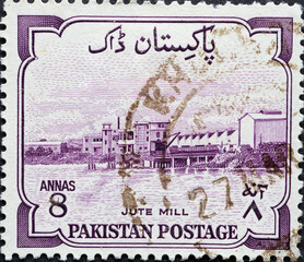Pakistan - circa 1955: a postage stamp from Pakistan , showing an industrial building of a jute mill