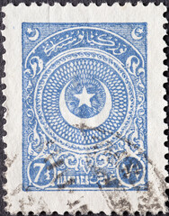 Turkey - circa 1923: a postage stamp from Turkey , showing the symbol of the Ottoman Empire....