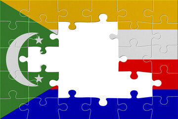 World countries. Puzzle- frame background in colors of national flag. Comoros