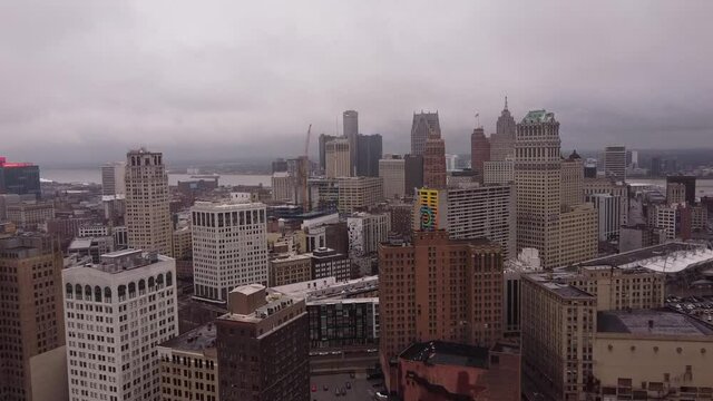 Famous downtown skyscrapers of Detroit city, aerial fly forward shot