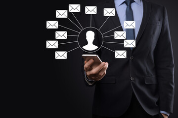 Male hand holding letter icon,email icons .Contact us by newsletter email and protect your personal information from spam mail. Customer service call center contact us.Email marketing and newsletter
