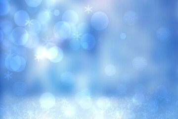 Abstract blurred festive winter christmas or Happy New Year background with shiny blue and white bokeh lighted snow landscape with sky and sun. Space.