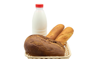 
Fresh bread and milk in a wicker basket on a white background