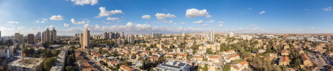 Fototapeta na wymiar 180 degree panoramic view on buildings in Beer Sheva city at winter
