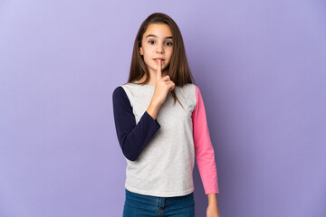 Little girl isolated on purple background showing a sign of silence gesture putting finger in mouth