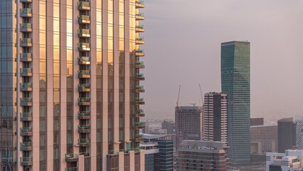 Obraz premium Aerial panoramic skyline of a big futuristic city timelapse. Business bay and Downtown