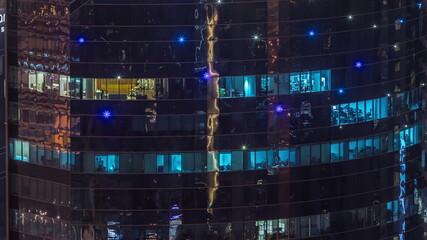 Windows lights in modern buildings timelapse at night