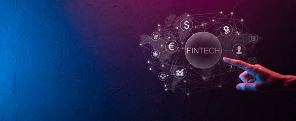 Businessman hold Fintech -financial technology concept.Business investment banking payment. Cryptocurrency investment and digital money. Business concept on virtual screen.