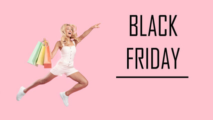 Black Friday. Excited woman jumping with shopping bags