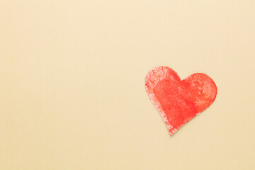 Cut the heart shaped paper, put on a pastel background.