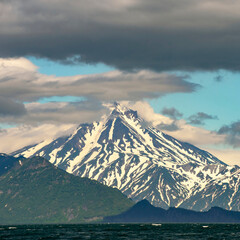 Naklejka na ściany i meble Volcanoes of Kamchatka. Travel, tourism and mountaineering on the Kamchatka Peninsula, Russia 