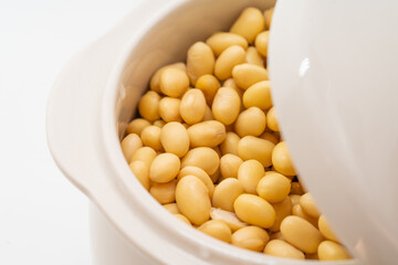 Soybeans with water on a pure white background