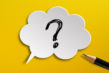 Question mark design with speech bubble and pencil on yellow background	